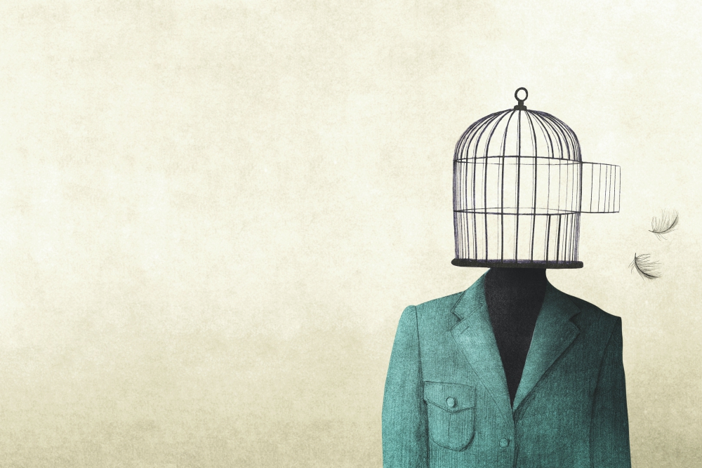 Scattered mind: a person in a green blazer with an open birdcage for a head.